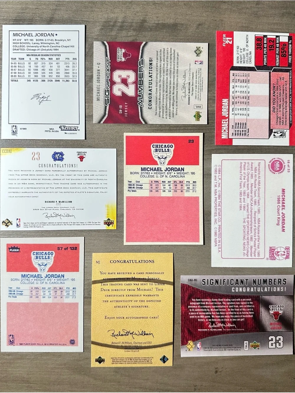 Michael Jordan Signed Rookie Lot of (9) Star UD Starting Lineup Novelty Cards.